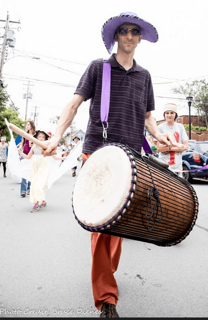 People in the Deep Roots Music Festival parade