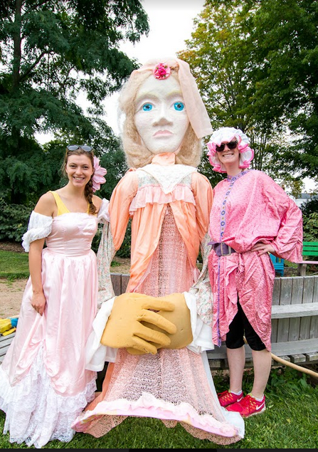 People in the Deep Roots Music Festival parade