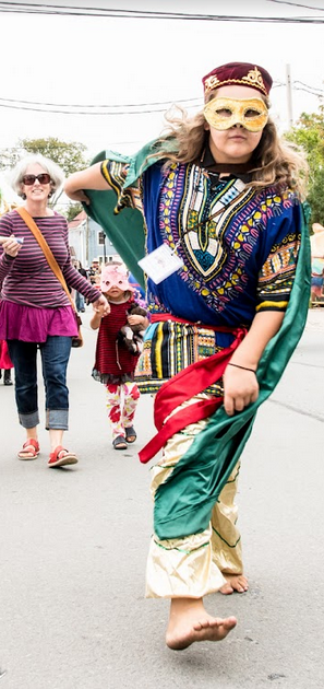 People in the Deep Roots Music Festival parade
