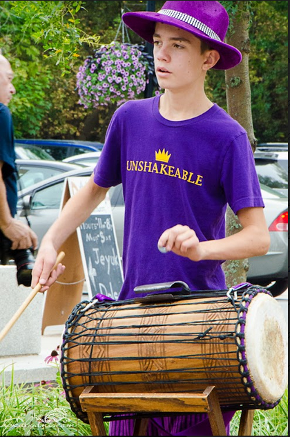 People in the Deep Roots Music Festival parade